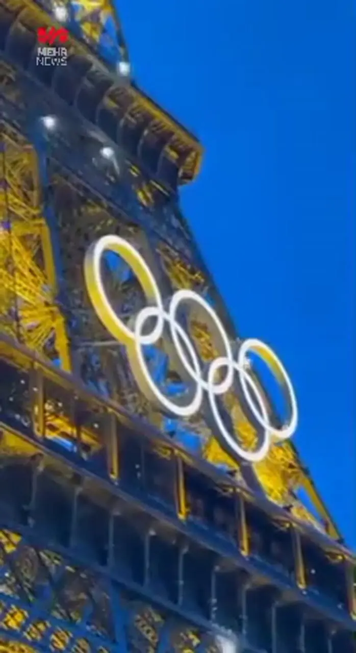 تصویر دیدنی حلقه های المپیک روی برج ایفل + ببینید